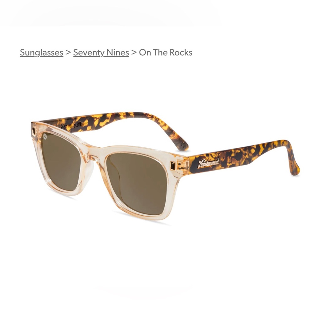 Knockaround sunglasses on the rocks